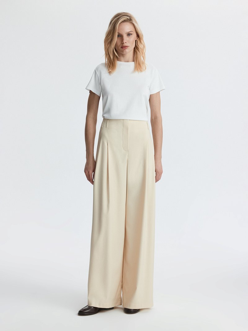 Широкие брюки с защипами