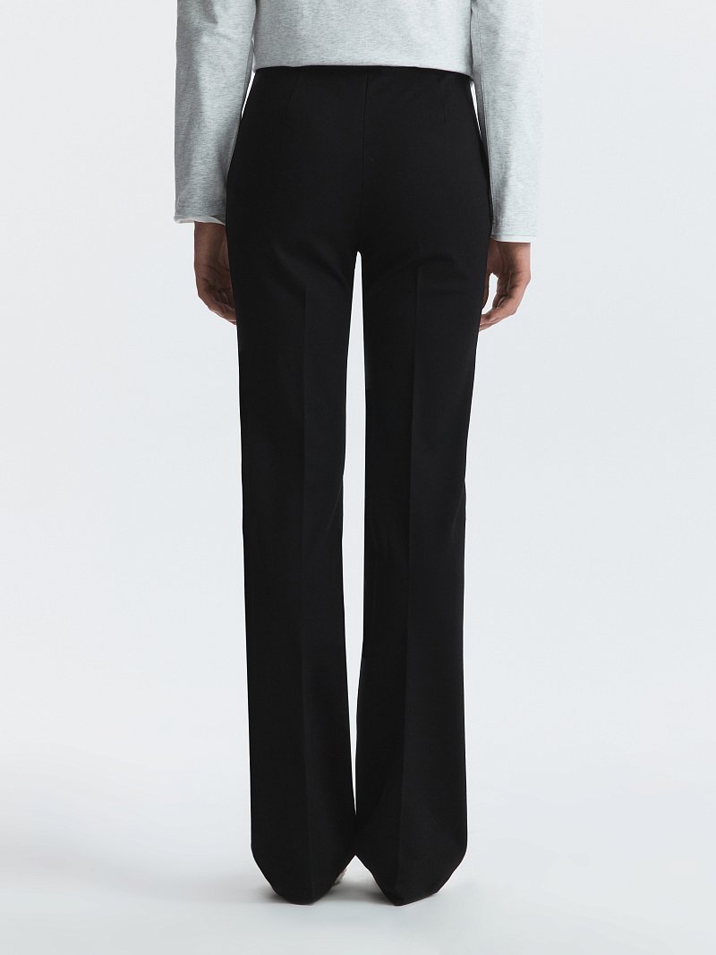 Расклешенные брюки из трикотажа