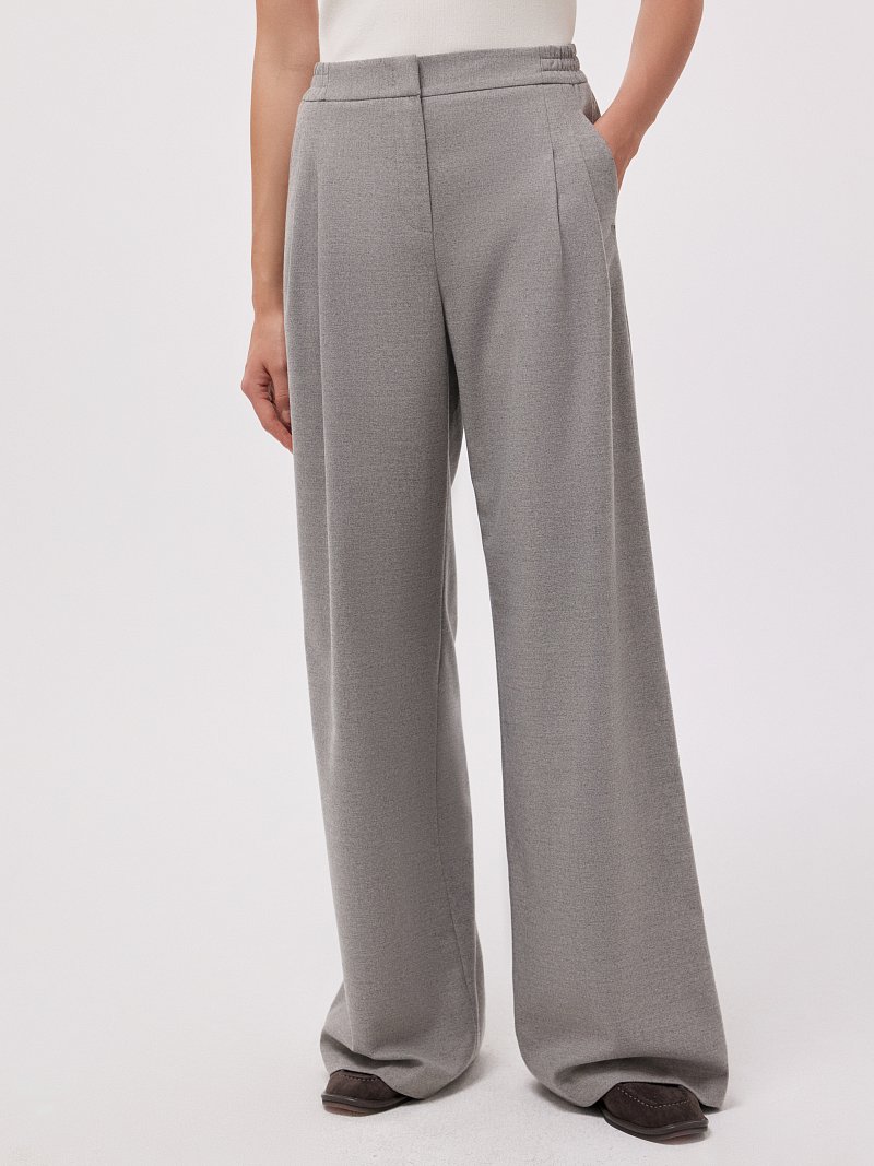 Широкие брюки с защипами