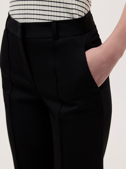 Расклешенные брюки с разрезами: фото №3