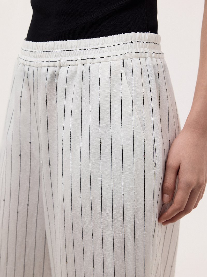 Брюки в полоску с пайетками