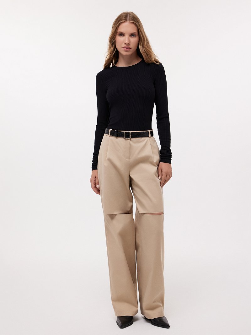 Брюки с разрезами на коленях