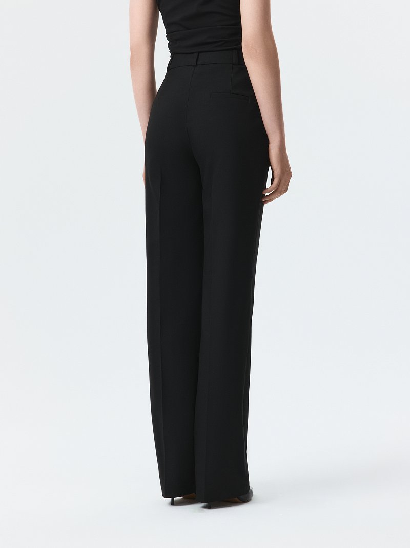 Удлиненные брюки со стрелками