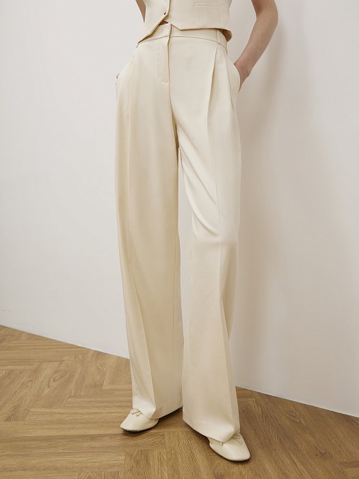 Удлиненные брюки с защипами: фото №2