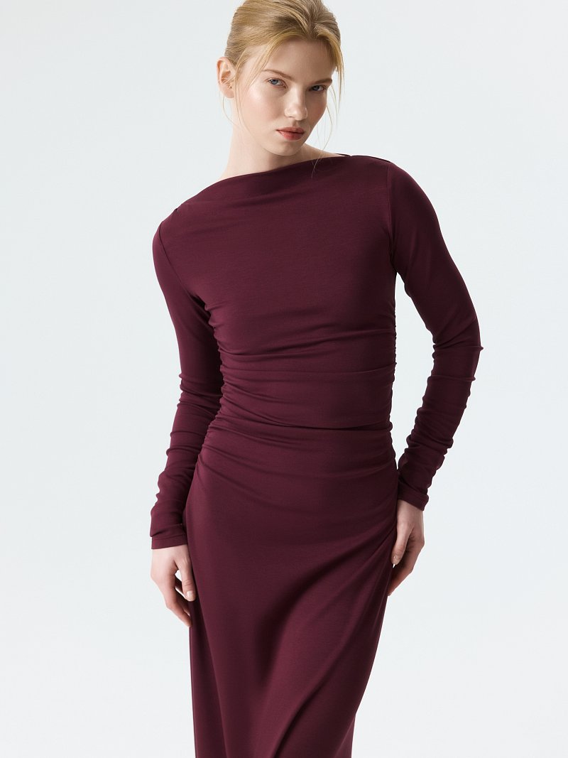 Трикотажное платье с драпировками