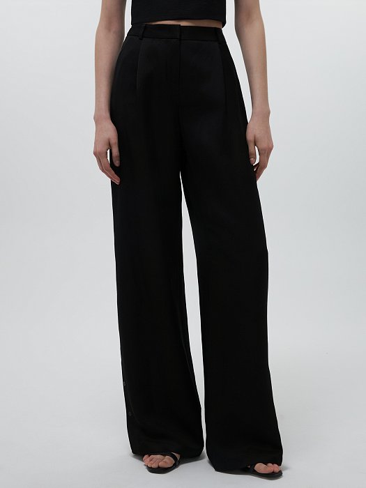 Широкие брюки с хлястиками: фото №2