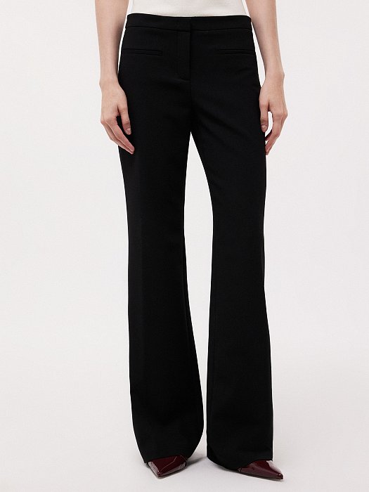 Расклешенные брюки с низкой посадкой: фото №2