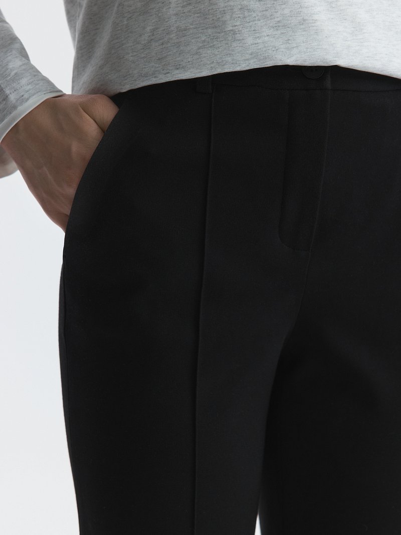 Расклешенные брюки из трикотажа