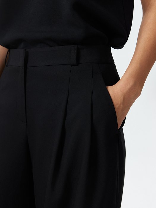 Широкие брюки с защипами: фото №5