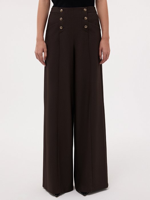 Широкие брюки с декоративными пуговицами: фото №3