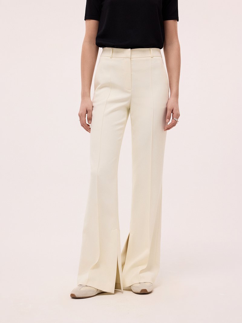 Расклешенные брюки с разрезами