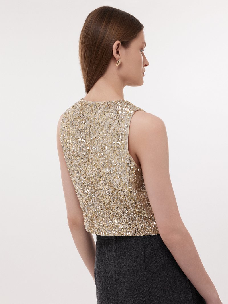 Жилет в пайетках