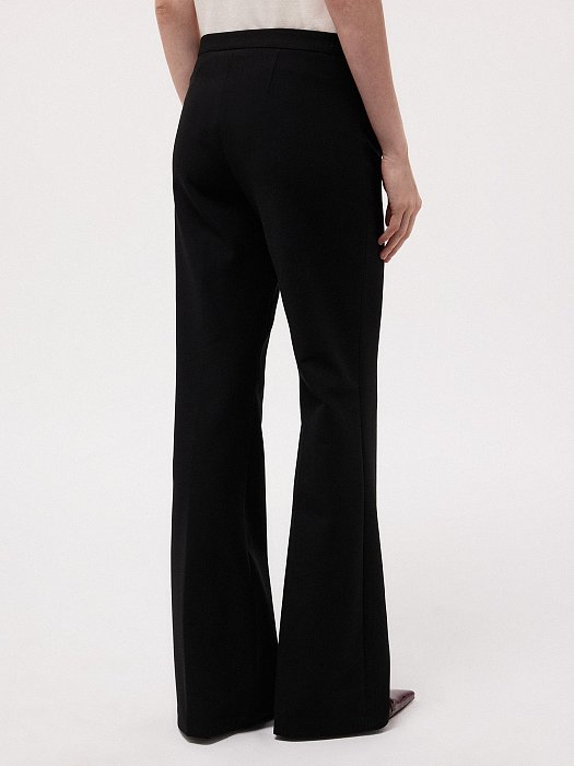 Расклешенные брюки с низкой посадкой: фото №3