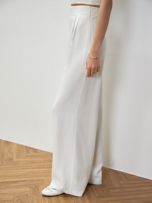 Широкие брюки с защипами: фото №3