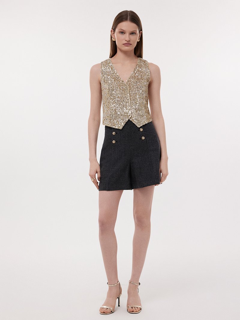 Жилет в пайетках