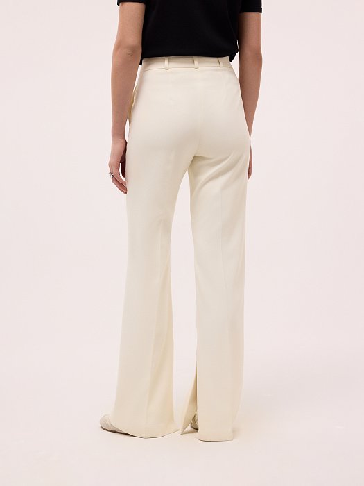 Расклешенные брюки с разрезами: фото №5