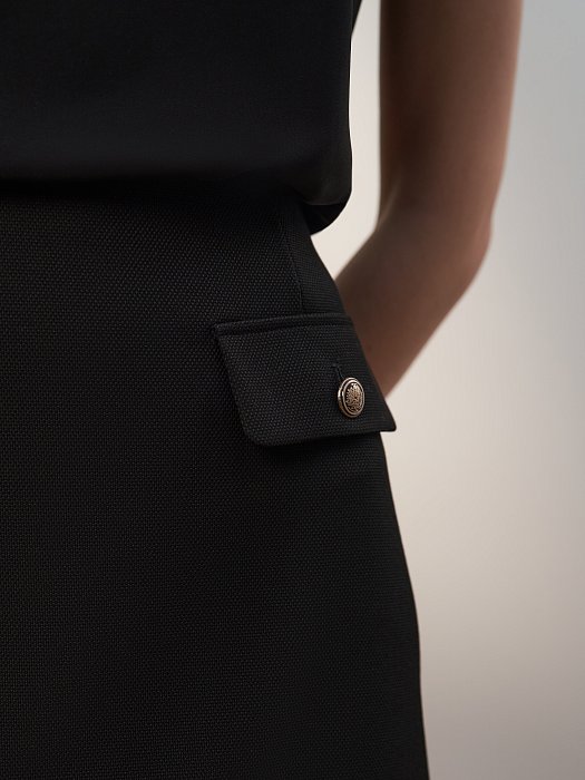 Юбка-мини с тиснеными пуговицами: фото №3