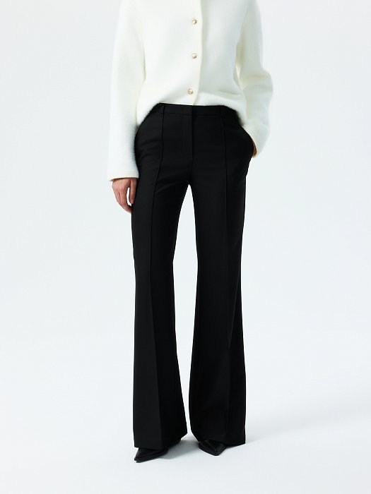 Расклешенные брюки со стрелками: фото №2