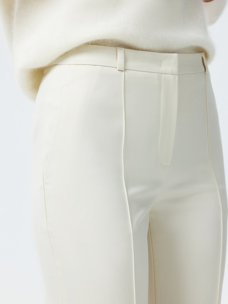 Расклешенные брюки со стрелками