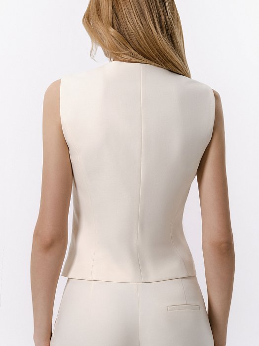 Однобортный жилет на пуговицах: фото №6