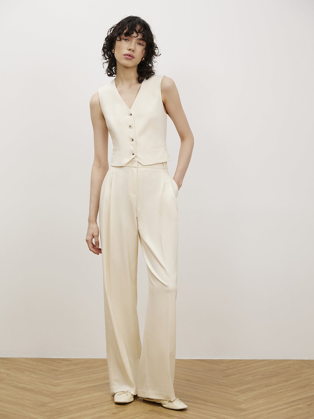 Удлиненные брюки с защипами: фото №1