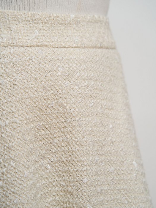 Расклешенная юбка из твида: фото №3