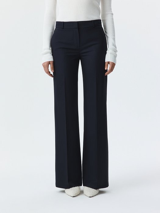 Расклешенные брюки со стрелками: фото №2