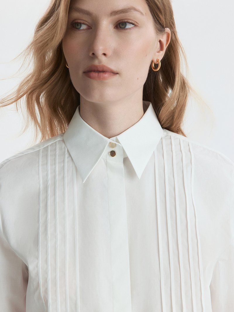 Хлопковая блуза с рельефами