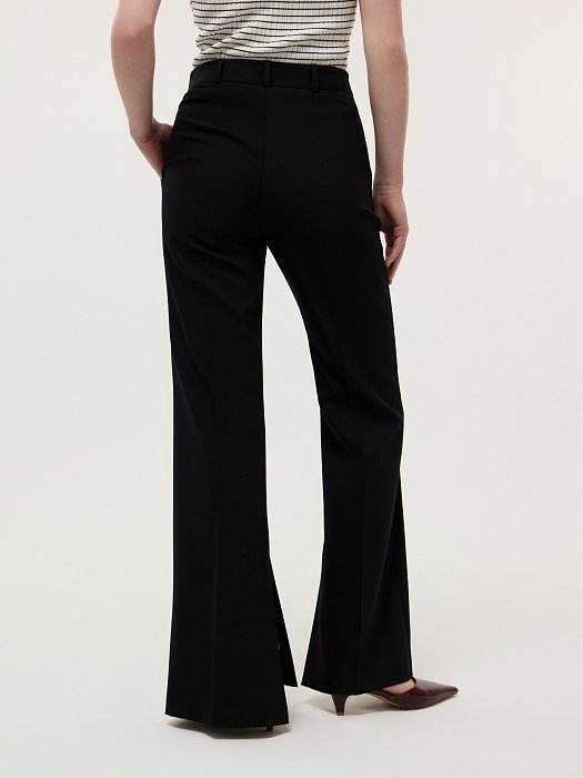 Расклешенные брюки с разрезами: фото №4