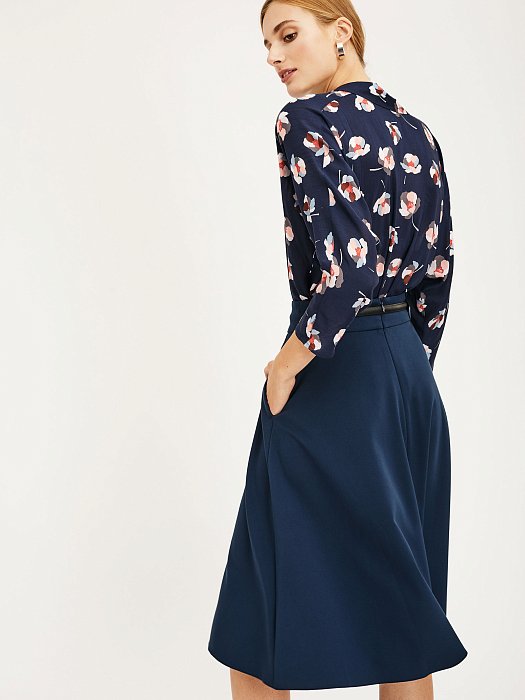 Расклешённая юбка-миди: фото №3