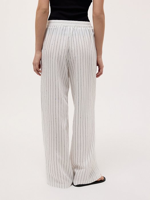 Брюки в полоску с пайетками: фото №4