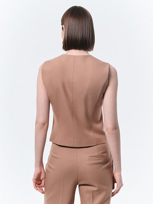 Однобортный жилет на пуговицах: фото №6