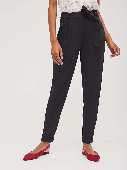 Зауженные брюки с отворотами: фото №2