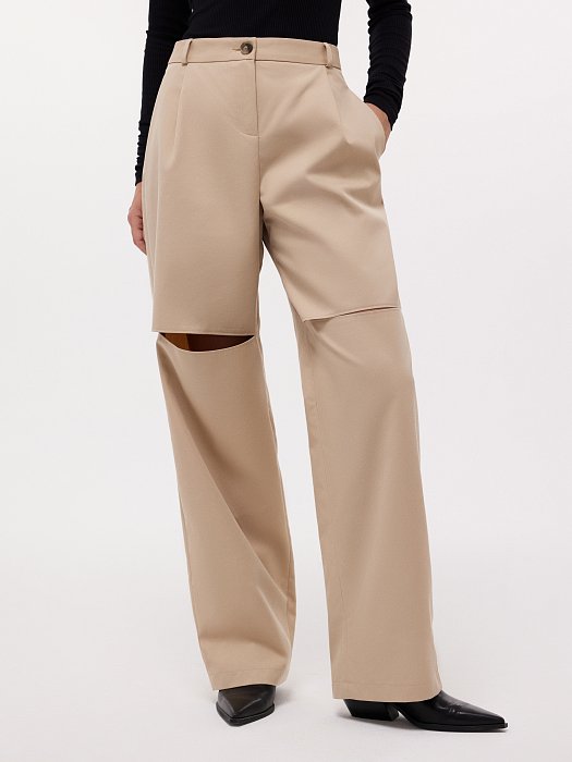 Брюки с разрезами на коленях: фото №2