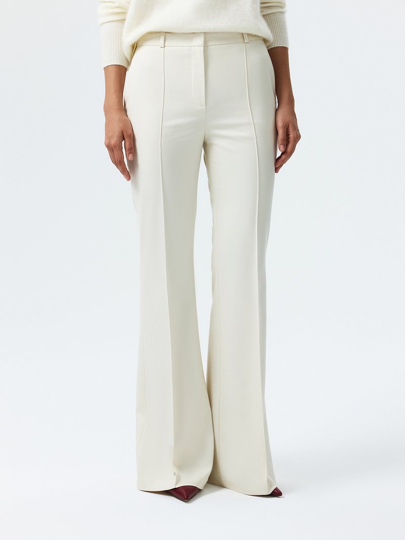 Расклешенные брюки со стрелками