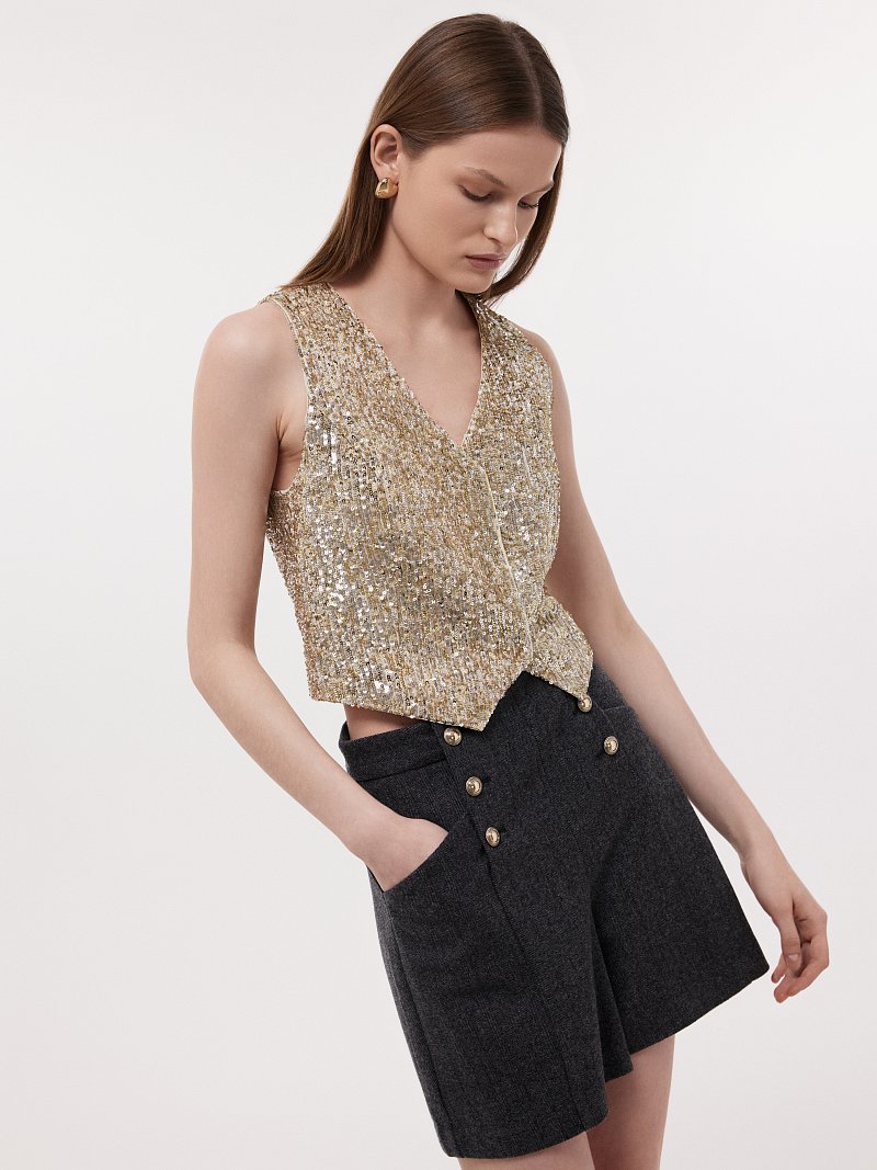 Жилет в пайетках