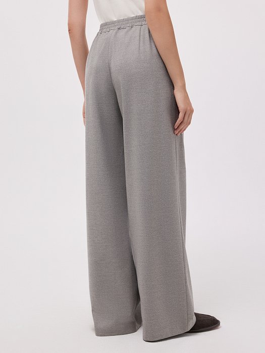 Широкие брюки с защипами: фото №3